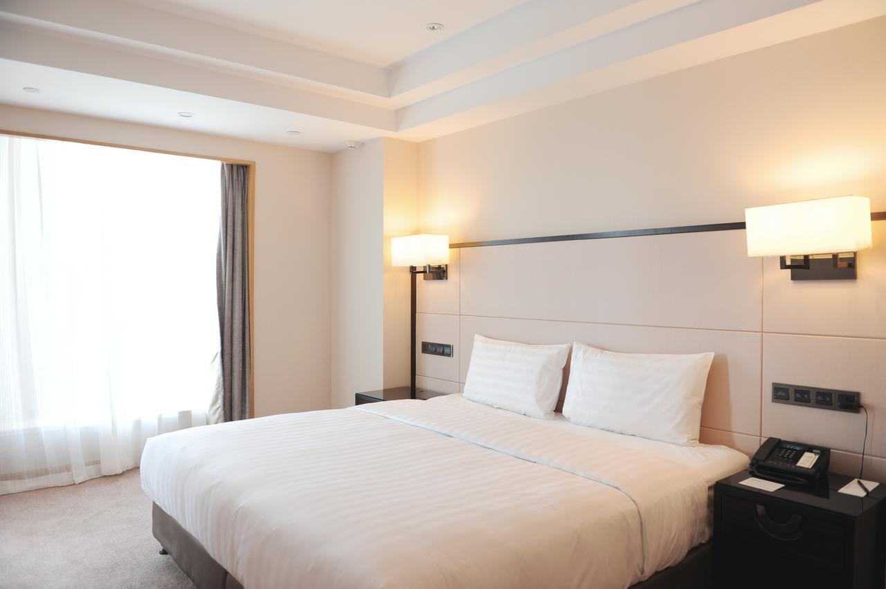 Pullman Qingdao Ziyue Hotel Bagian luar foto