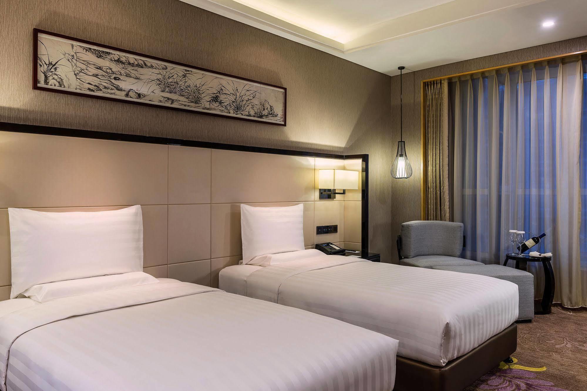 Pullman Qingdao Ziyue Hotel Bagian luar foto